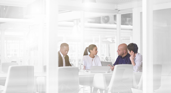 2 men, 2 women are in a meeting