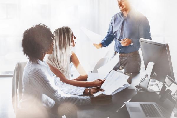 people-in-office_a-man-presenting-to-two-women