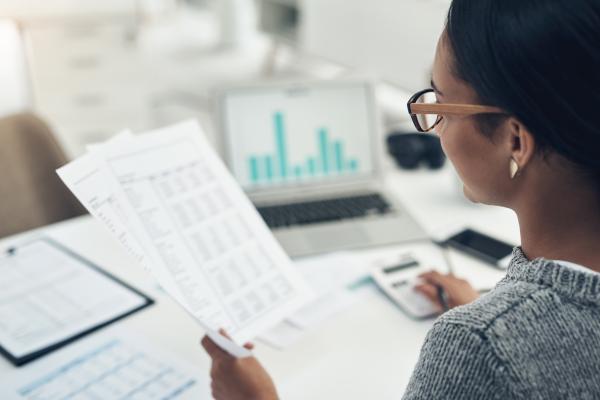 woman checking a report