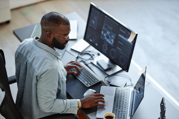 man working at his desk