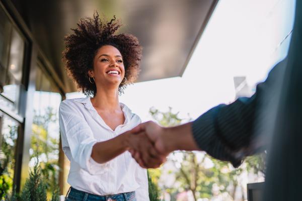 woman shaking hands