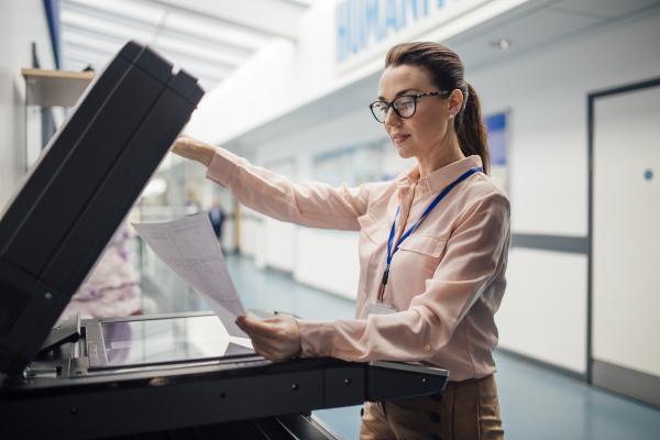 woman making photocopies