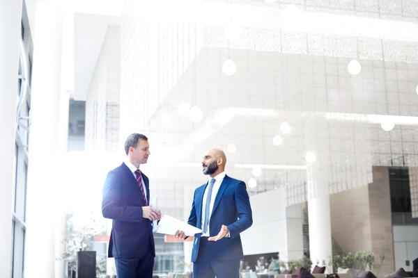 men talking in the office