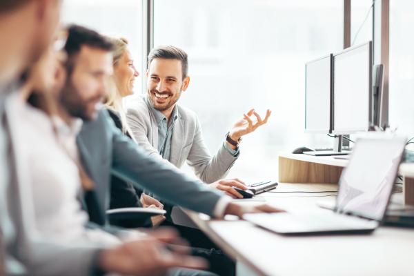 employees sitting at desk