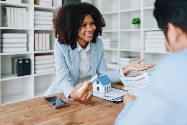 woman explaining a mortgage