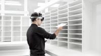Mailroom-Management_man-checking-mails-on-shelf