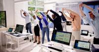 people exercising in the office