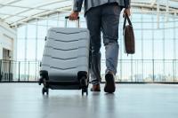 man walking with a suitcase